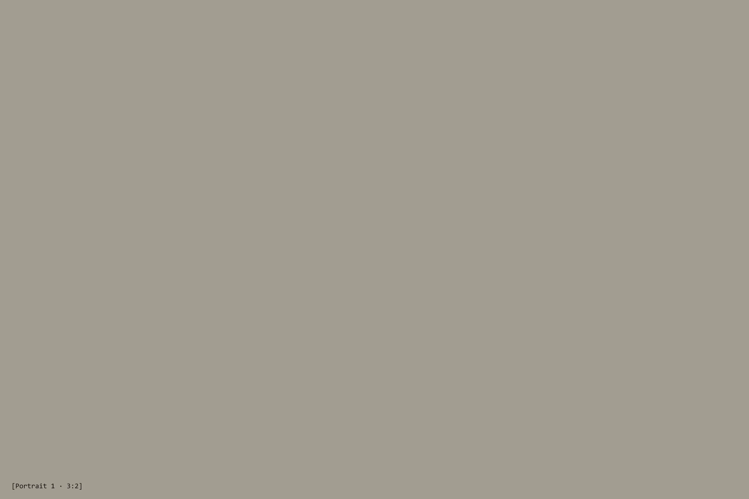 [Describe the photo: portrait placeholder 1]
